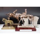 Two horse racing trophies together with a brass door stop in the form of a horse and a pair of horse