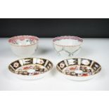 Two 19th century New Hall porcelain tea bowls with hand painted floral decoration (approx 8.5cm and