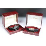 Two gents quartz Rotary wristwatches, both with black dials and complete with display cases.