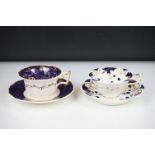 Two 19th century Rockingham porcelain teacups & saucers to include an example decorated with