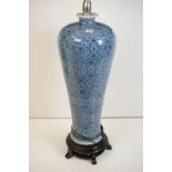 Large Chinese blue & white ceramic standard lamp, of shouldered form, scrolling floral & foliate