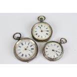 A collection of three silver cased ladies fob watches, two with enamel decoration to the dial.