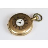 A early 20th century 14k gold plated half hunter pocket watch.