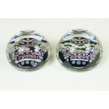 Two Whitefriars QEII silver jubilee faceted glass millefiori paperweights, the millefiori canes