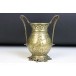 Bronze twin-handled urn vase, cast in relief with a classical man and woman, fleur-de-lis style