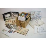 A large collection of British and world stamps, mostly within albums to include First Day Covers And