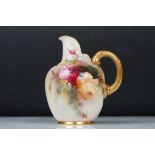 Royal Worcester jug with hand painted Rose decoration, signed R Austin, gilt handle, date code for