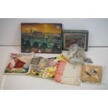 A box of mixed collectables to include a Victory wooden jigsaw puzzle, souvenirs from the 1951