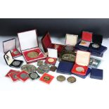 A collection of mixed coins and medallions to include fine silver proof examples together with a