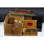 A box of mixed collectables to include a mid 20th century first aid kit, vintage model rail, camera,
