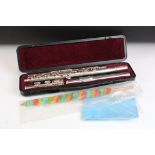 A Yamaha flute contained within original protective case together with a cleaning brush.