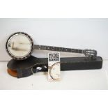 A vintage Banjo, mother of pearl inlay, complete with case.