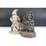 Two Punch & Judy cast iron door stops to include a painted example.