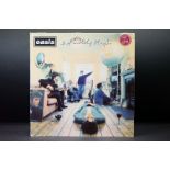 Vinyl - Oasis Definitely Maybe on Creation Records CRE LP 169 Damont pressing. Sleeve has folds/