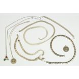 A collection of 925 sterling silver jewellery to include necklaces and St. Christopher pendants.