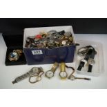 A small collection of vintage wristwatches and watch parts.