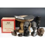 A collection of tribal artefacts from the Congo to include a ceremonial stool and three carved