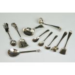 Georgian caddy spoon, pair of Georgian salt shovels and other condiment spoons
