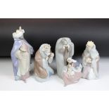 Lladro nativity group featuring Mary and Joseph with the infant Jesus and the three kings. All