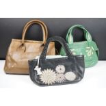 Three Radley Leather Handbags, one black decorated with flowers and with dog tag, approx. 29cm wide,