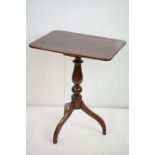 Early 19th century Mahogany Table, the rectangular top raised on a pedestal support with three