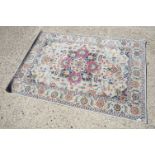 Turkish Polypropylene Pile Rug with a Persian white multi colour pattern, 120cm x 70cm