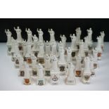 35 ceramic crested ware / goss figurines of Florence Nightingale, each with a town crest to the