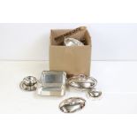 A Victorian silver plated breakfast dish, a silver handled fruit bowl, two oval entree dishes and