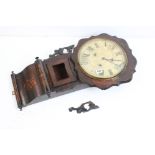 An antique large wooden wall clock with 30cm dial, measures 80cm in height.