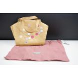 Two Radley Leather Handbags, one mustard decorated with flowers on a branch, 24cm wide, and the