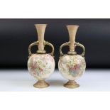 Pair of 19th Century Victorian Doulton Burslem ivory blush twin handled vases. Each having floral