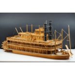A kit built wooden model of the Showboat paddle steamer, measures approx 80cm in length.