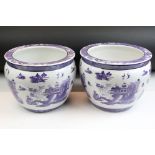 Pair of 20th Century Chinese planter pots. Each having purple printed landscape scenes to the