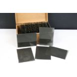 Collection of approx. 45 early 20th Century glass negative slides presented in a box, mostly