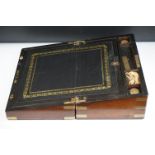 19th Century mahogany writing slope having brass banding to the exterior opening to reveal a black