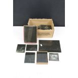 Assorted early 20th Century assorted glass negative slides including some military examples as