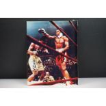 Photograph of a Boxing Match between Muhammad Ali and Joe Frazier, bearing two signatures, photo