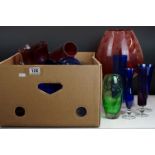 Collection of 20th Century coloured glassware to include cranberry glass vases, blue glass vases and