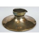 A hallmarked sterling silver capstan inkwell complete with liner, measures approx 165mm across the