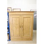 Victorian Pine Wardrobe, the double panel doors opening to a rail with hanging space, 152cm wide x