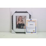 Madonna autograph - a signed photograph of Madonna at the Golden Globe awards with certificate of