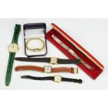A small collection of ladies and gents wristwatches to include a 9ct gold cased example.