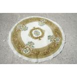 Cream and Green Ground Circular Rug with floral pattern, approx. 185cm diameter