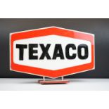 Texaco petrol advertising sign. The sign having a wooden base with double sided plastic Texaco red