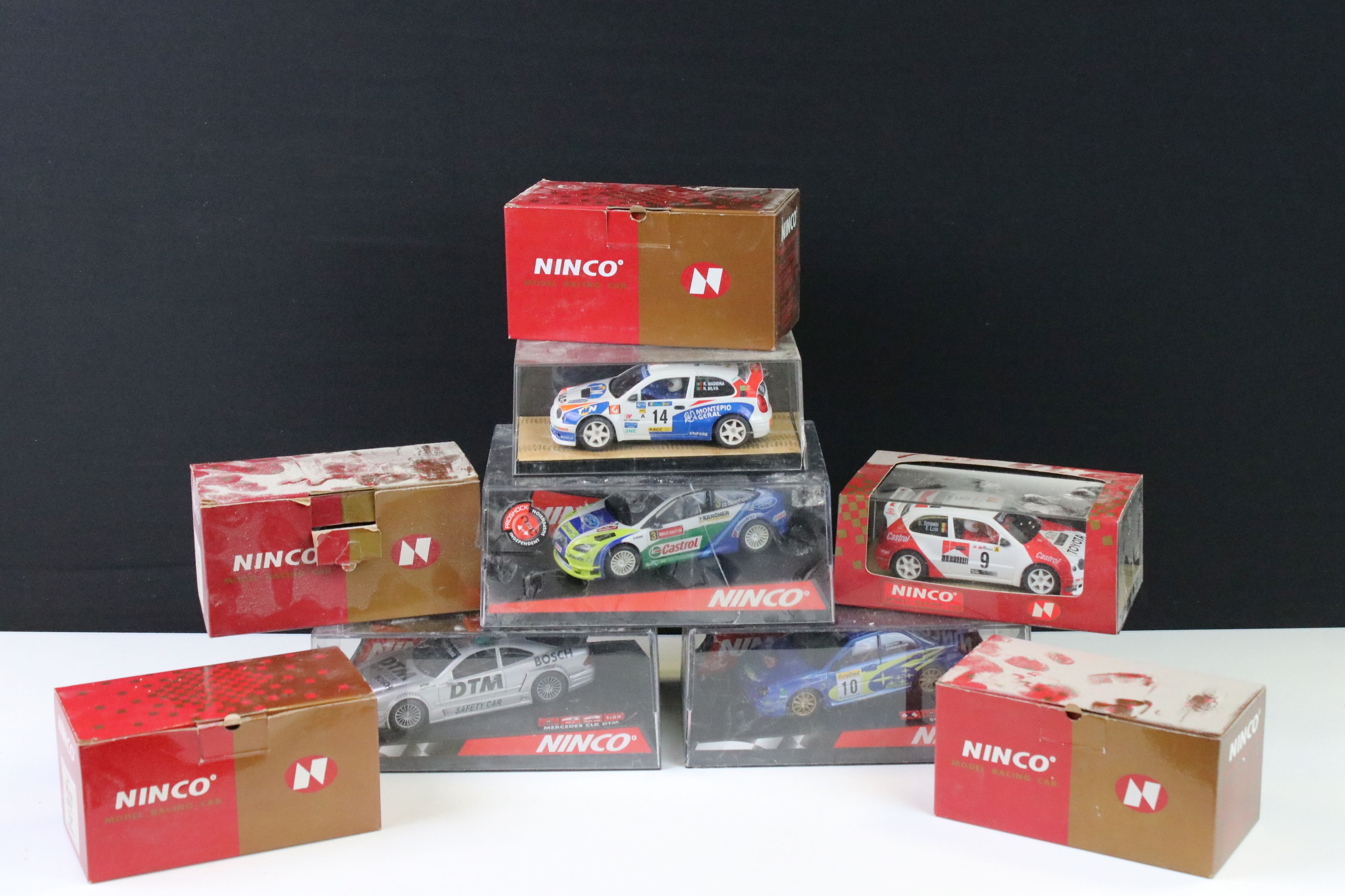 Nine cased / boxed Ninco slot cars to include, 50101 Renault Clio 16V, 50102 Renault Clio 16V, 50104