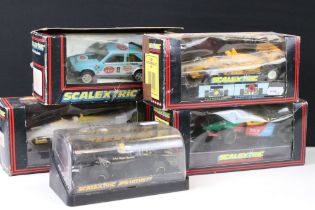Five boxed / cased Scalextric slot cars to include C126 JPS Lotus 77, C.138 Saudia Leyland