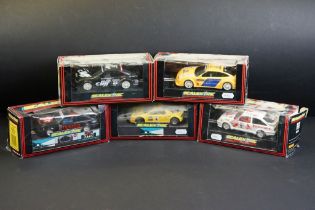 Five boxed Scalextric slot cars to include C.596 Calibra Old Spice, C.456 Ford Cosworth, H.631