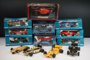 Nine boxed / cased Scalextric slot cars to include c051 brm p160, c28 Renault Alpine, C4 Electra,
