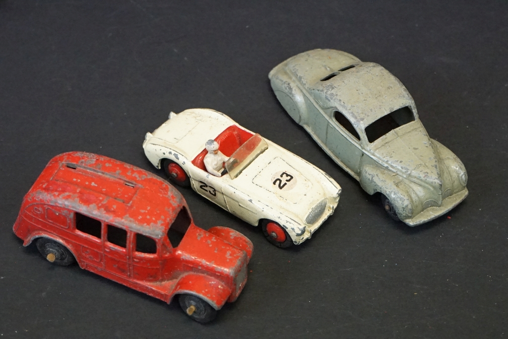 Around 25 early-mid 20th C play worn diecast models to include road, commercial and racing examples - Image 8 of 12