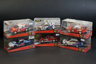 Six cased SCX 1:32 Scale Racing System slot cars to include 60740 Citroen Xsara WRC "2001", 61220
